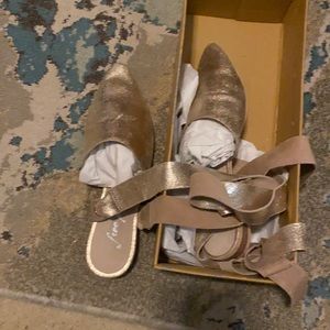 Free people gold mule style wrap around the leg